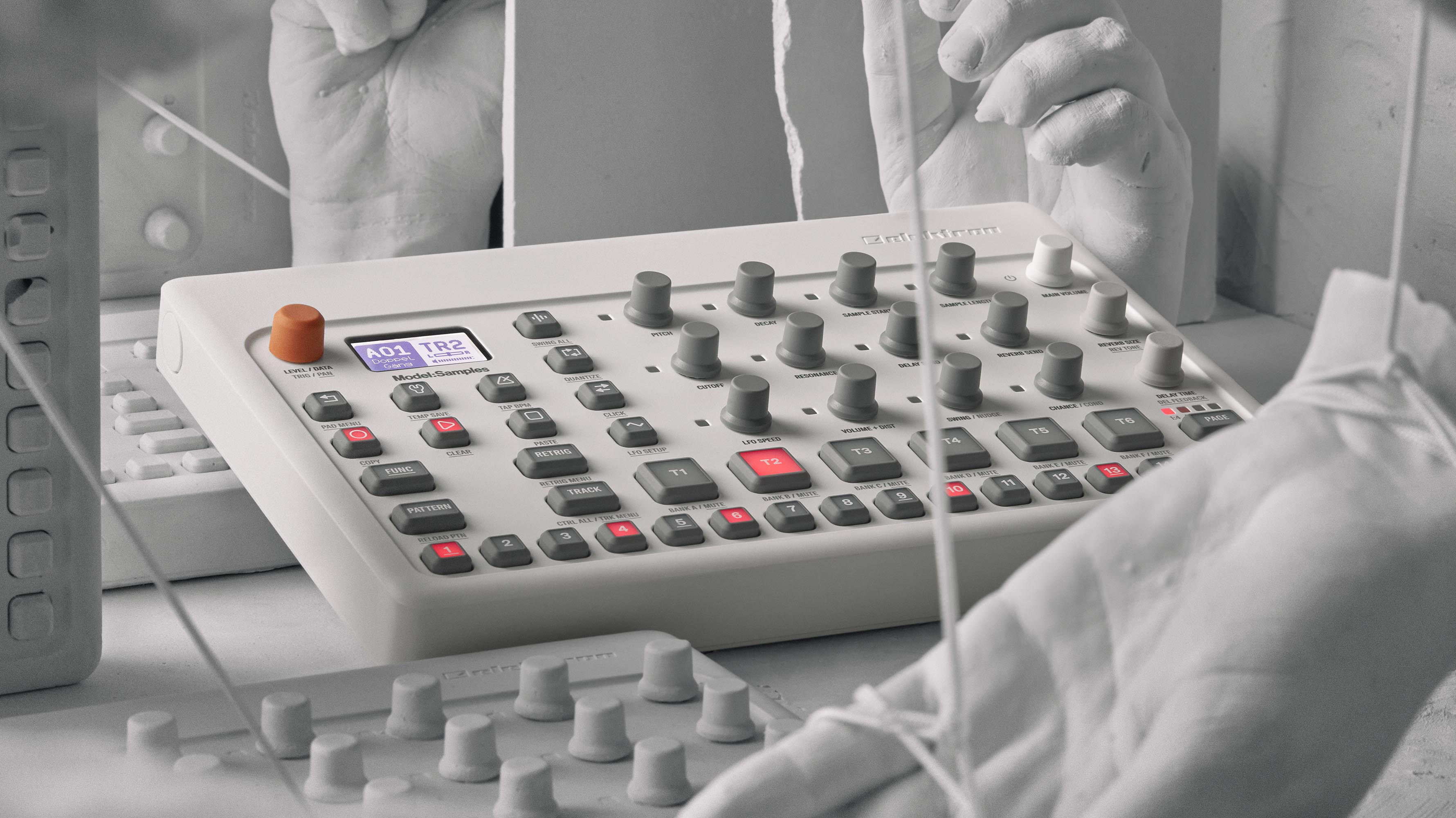 The knobby Model:Samples surrounded by disembodied plaster hands.